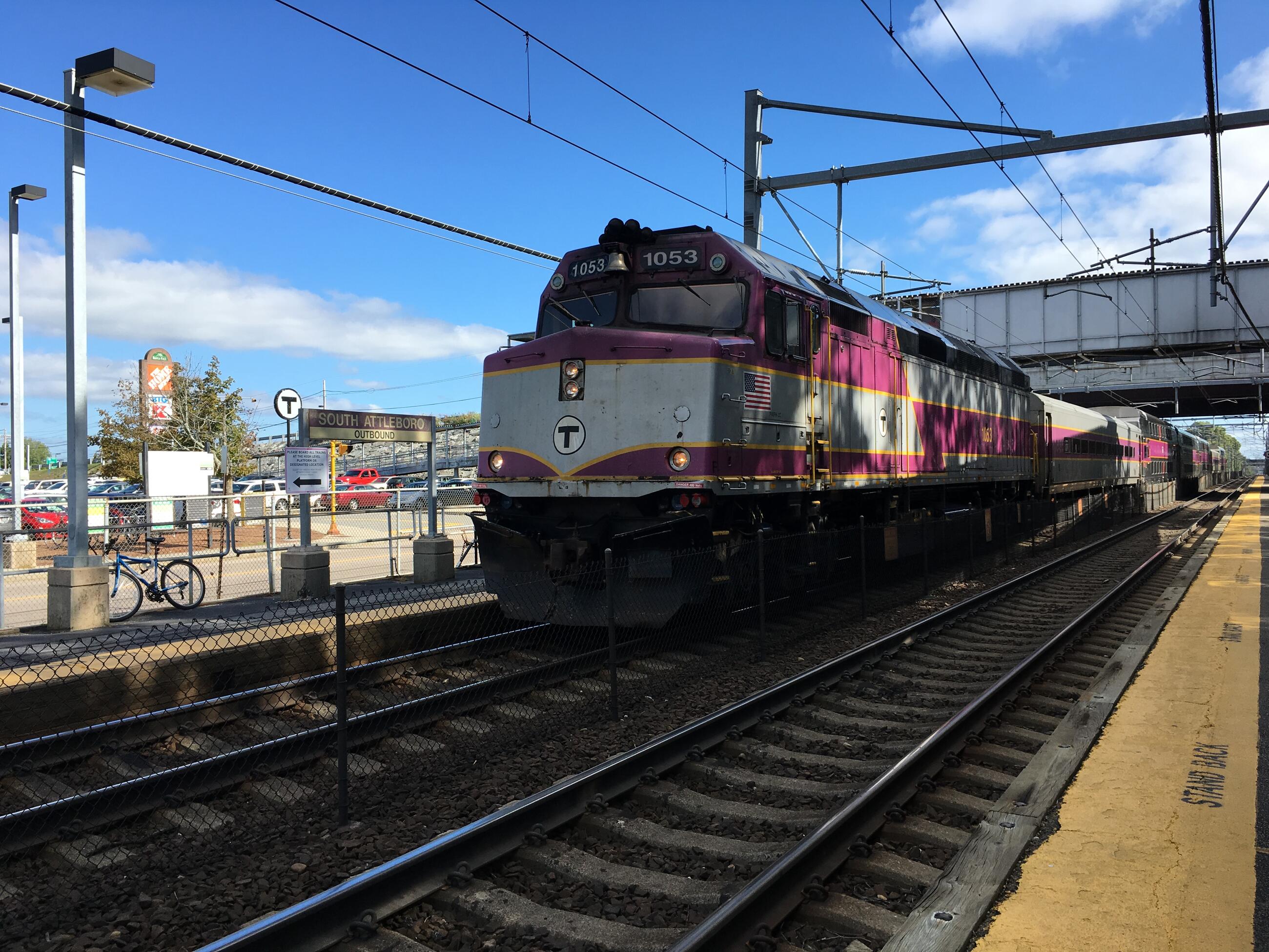 View of outbound commuter rail train stopped at the South Attleboro station. 