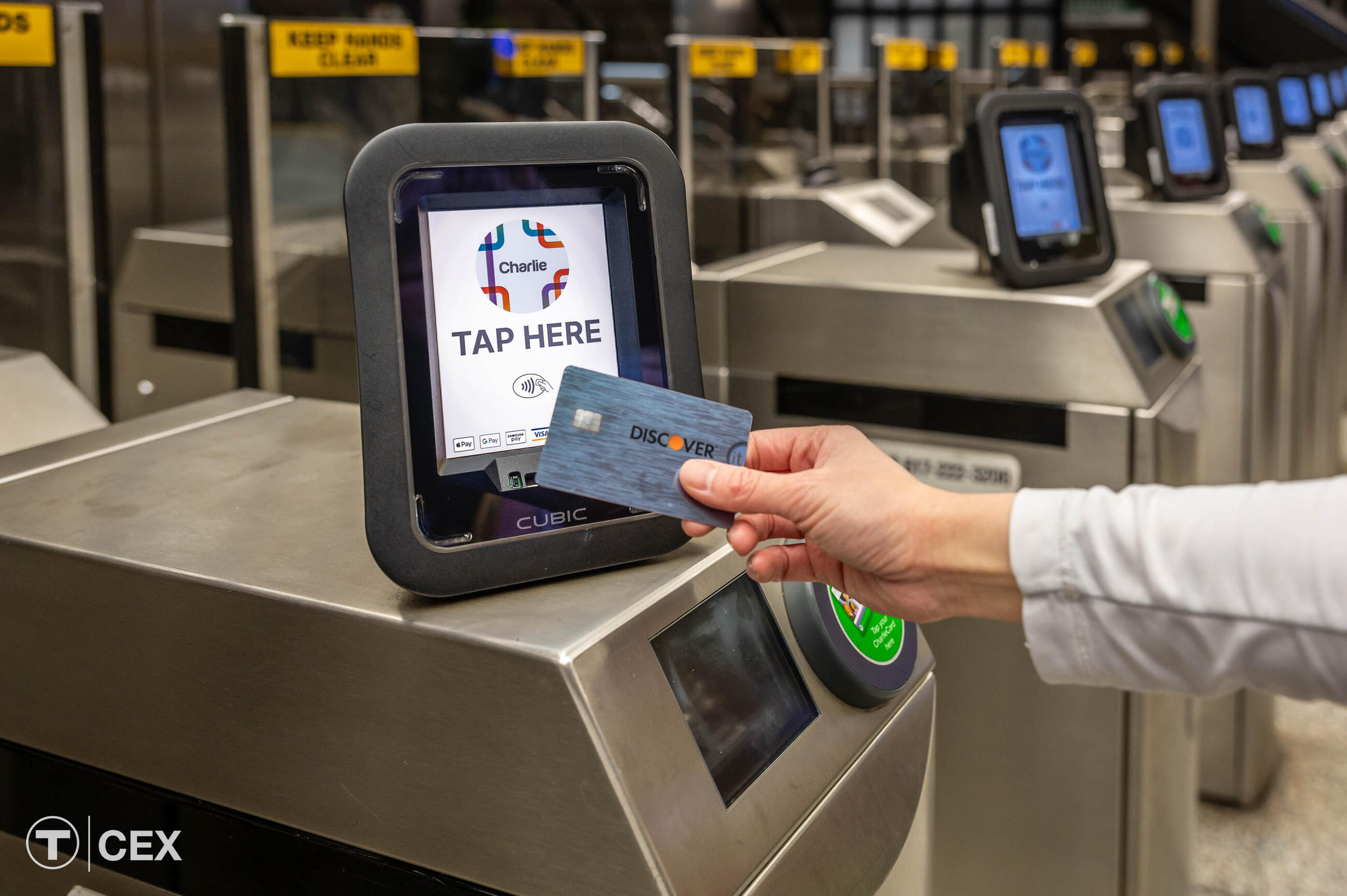 Contactless credit card at station fare reader.